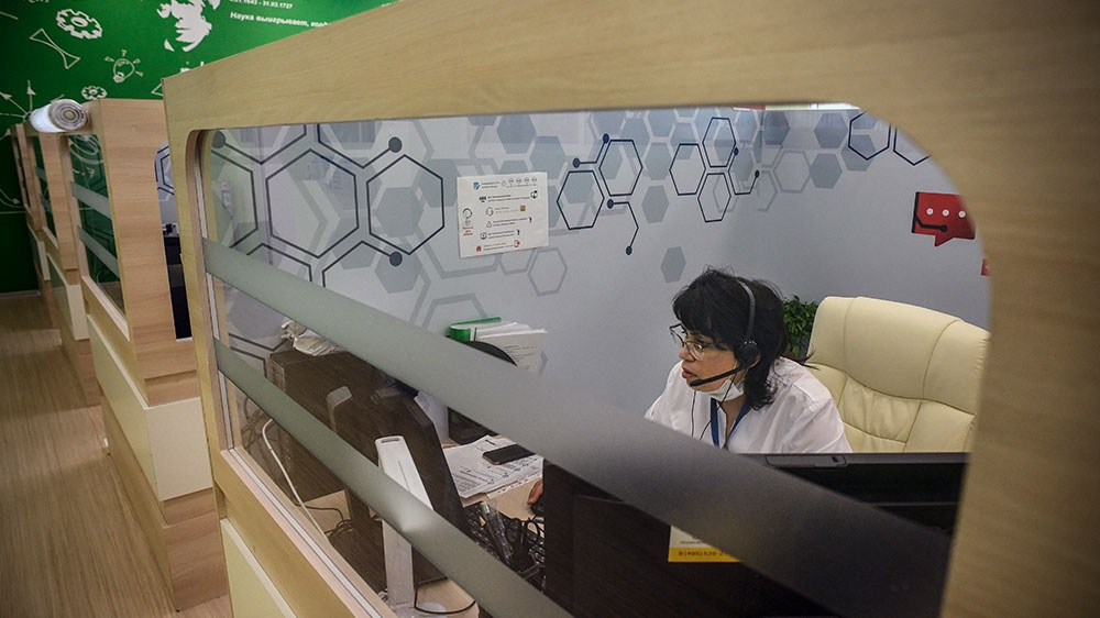 A doctor speaks with a patient during an online consultation session at a telemedicine centre in Moscow