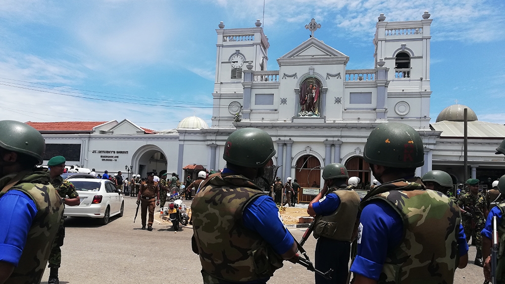 The clock at St. Anthony’s Shrine stopped at 8.45am. The time the bomb exploded. [Aanya Erinyes/Al Jazeera]