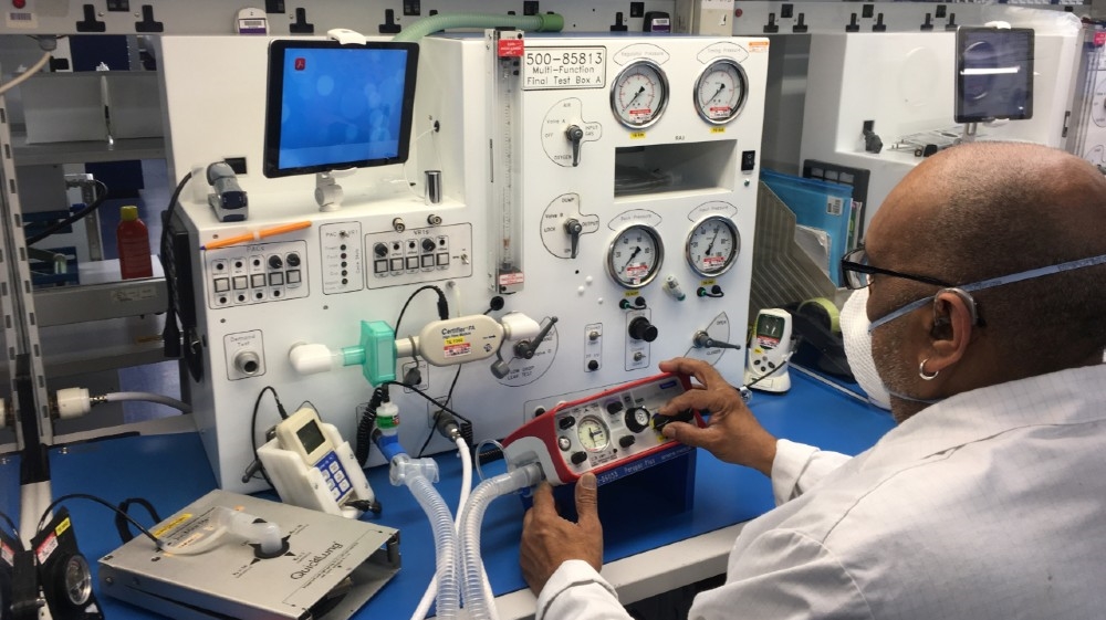 An employee checks a Smiths Medical 