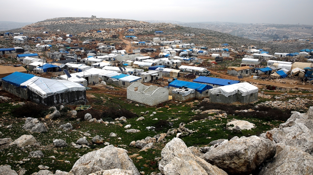 Makeshift shelters of internally displaced Syrians are seen from a hill top as part of an IDP camp located in Sarmada, Idlib province, Syria February 28, 2020. REUTERS/Umit Bektas