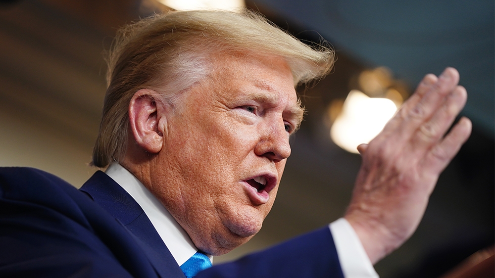 epaselect epa08349436 US President Donald J. Trump, joined by members of the Coronavirus Task Force, delivers remarks on the COVID-19 pandemic in the James S. Brady Press Briefing Room of the White Ho
