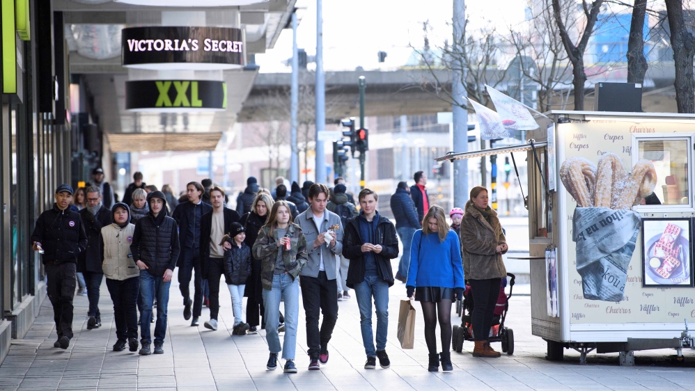 People walk in Stockholm