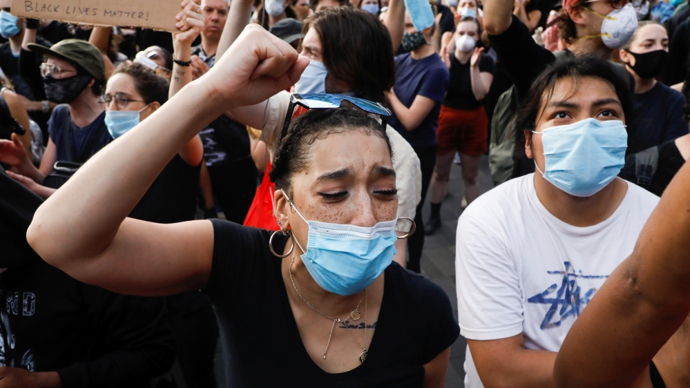 People take part in a protest over Floyd’s death in the Brooklyn borough of New York City, US, May 29, 2020