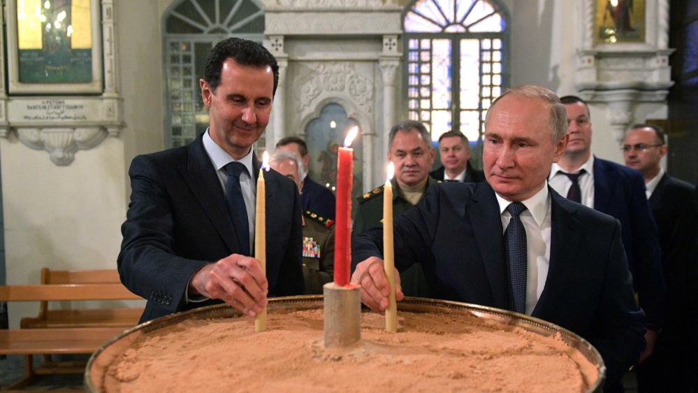 Russian President Vladimir Putin and his Syrian counterpart Bashar al-Assad visit an Orthodox Christian cathedral in Damascus, Syria January 7, 2020. Sputnik/Alexei Druzhinin/Kremlin via REUTERS ATTENTION EDITORS - THIS IMAGE WAS PROVIDED BY A THIRD PARTY.