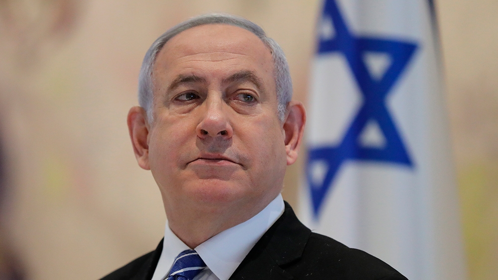 Israeli Prime Minister Benjamin Netanyahu attends the first Cabinet meeting of the new government at the Chagall Hall in the Knesset, the Israeli Parliament in Jerusalem, Israel, Sunday, May 24, 2020.