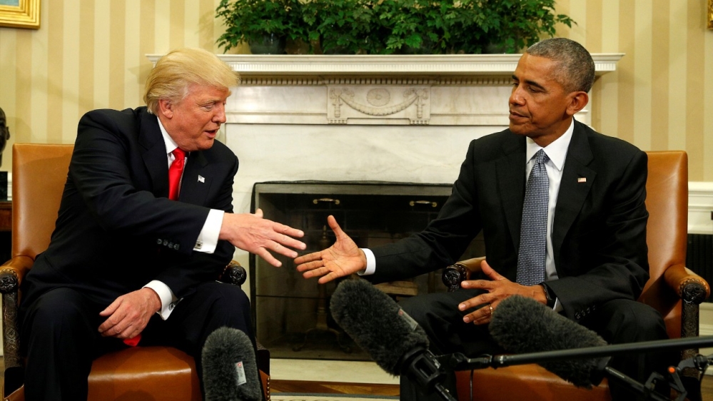 Then US President Obama meets with President-elect Donald Trump in the Oval Office of the White House during the transition period in November 2016