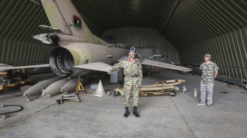 Libyan army retakes key airbase from warlord's forces