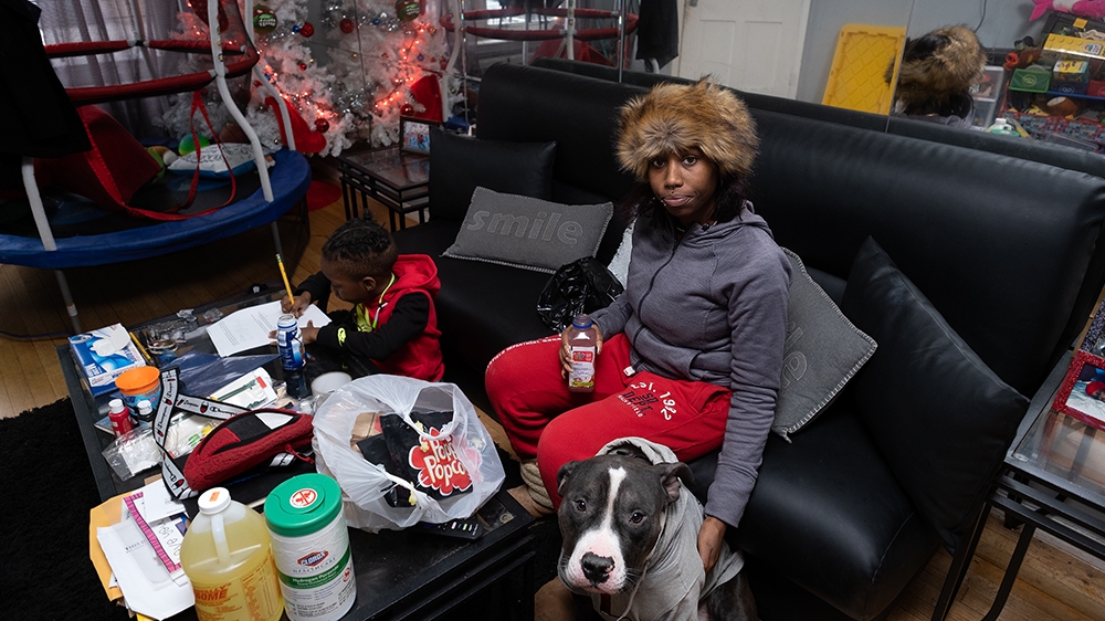 Still Here - Kamilah at home [Sara Bennett/Al Jazeera]