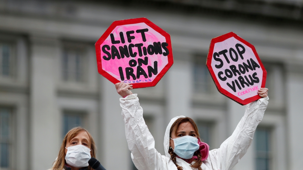 People protest in Washington DC against the role that US sanctions plays on Iran and the exacerbation of the coronavirus disease (COVID-19) worldwide