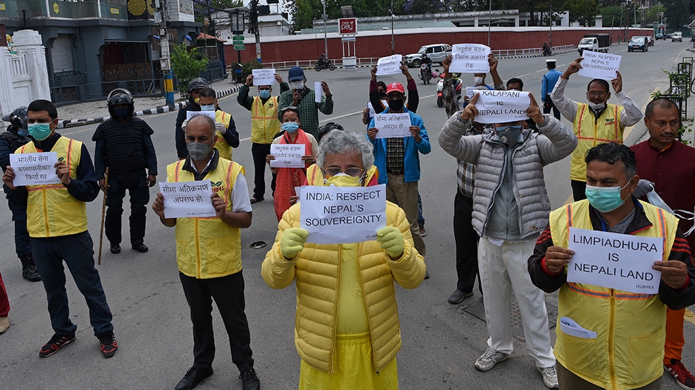Human rights activists protest near the Indian embassy in Kathmandu last month against India’s newly inaugurated link road to the Chinese border