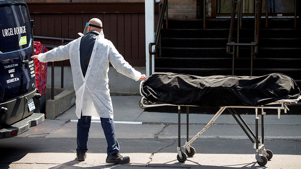 A body is removed from Centre d’hebergement Yvon-Brunet, a seniors’ long-term care centre, amid the outbreak of the coronavirus in Montreal, Canada