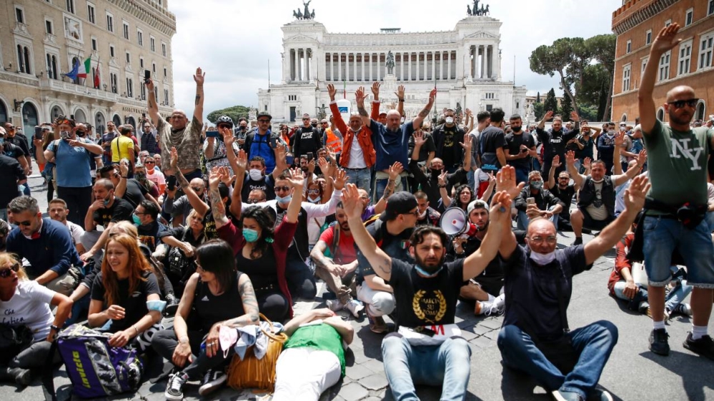Far-right demonstrators hold an anti-government protest in the Italian capital, Rome, on Saturday, following the economic crisis due to the pandemic
