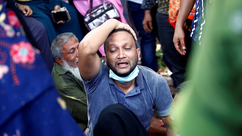 Relatives of victims mourn after a passenger ferry capsized in the river Buriganga in Dhaka, Bangladesh, June 29, 2020. REUTERS/Mohammad Ponir Hossain
