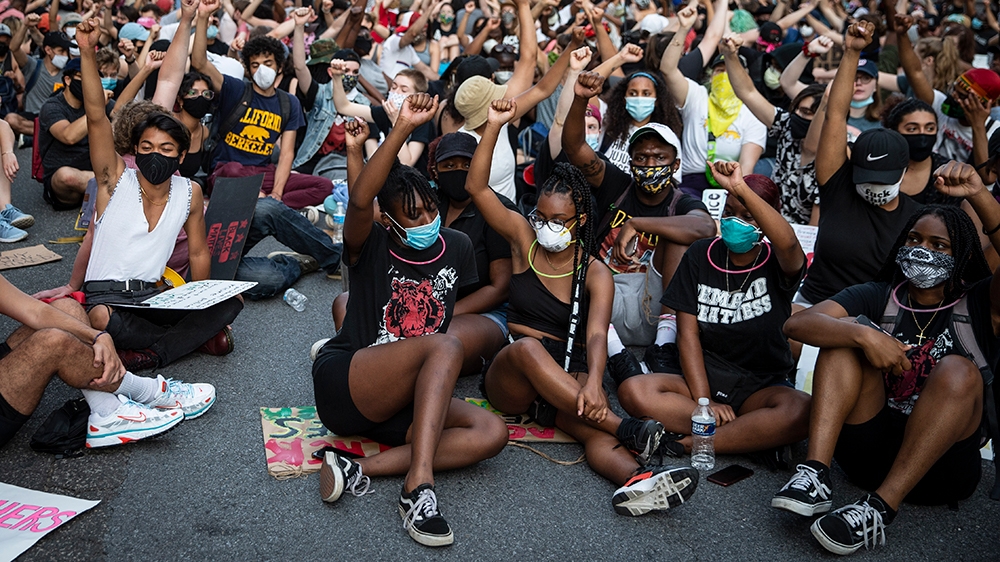 Ongoing protests against racial injustice spark fears of a resurgence of the virus in the US [EPA]