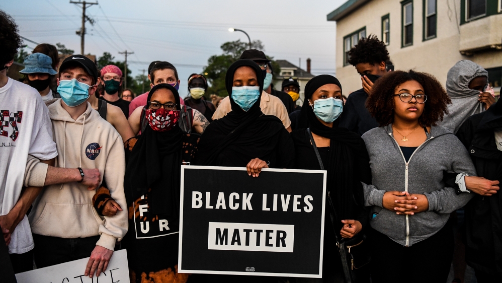 Protestors gather near the makeshift memorial in honour of George Floyd marking one week anniversary of his death, on June 1, 2020 in Minneapolis, Minnesota. Major US cities -- convulsed by protests,