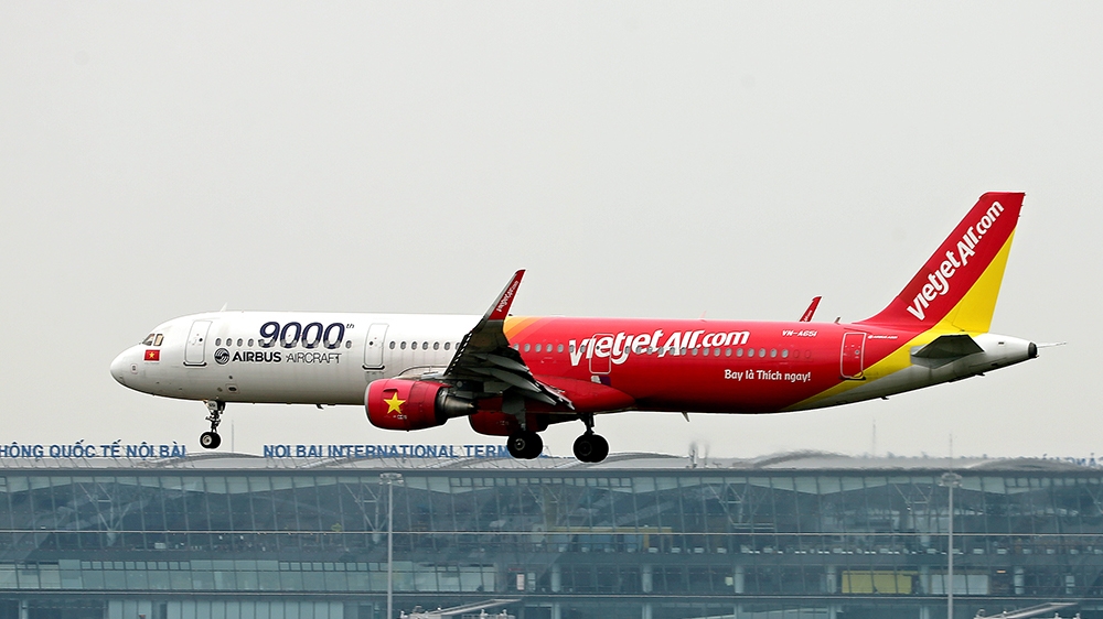 A Vietjet Air Airbus A320 lands at Noi Bai International Airport in Hanoi, Vietnam