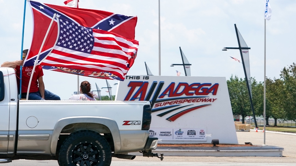 While no Confederate flags were allowed inside the race venue, demonstrators flew them outside the track