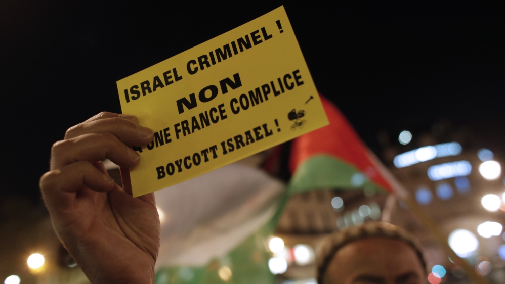 Pro-Palestinian supporters demonstrate in front of the Opera house in Paris