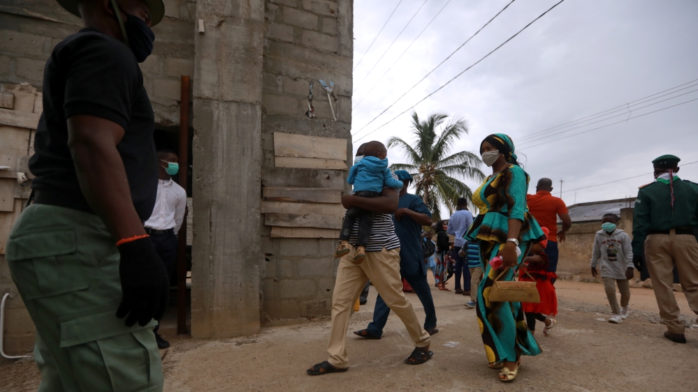 Security ensures the mandatory use of protective masks for Christian worshippers, as churches reopen
