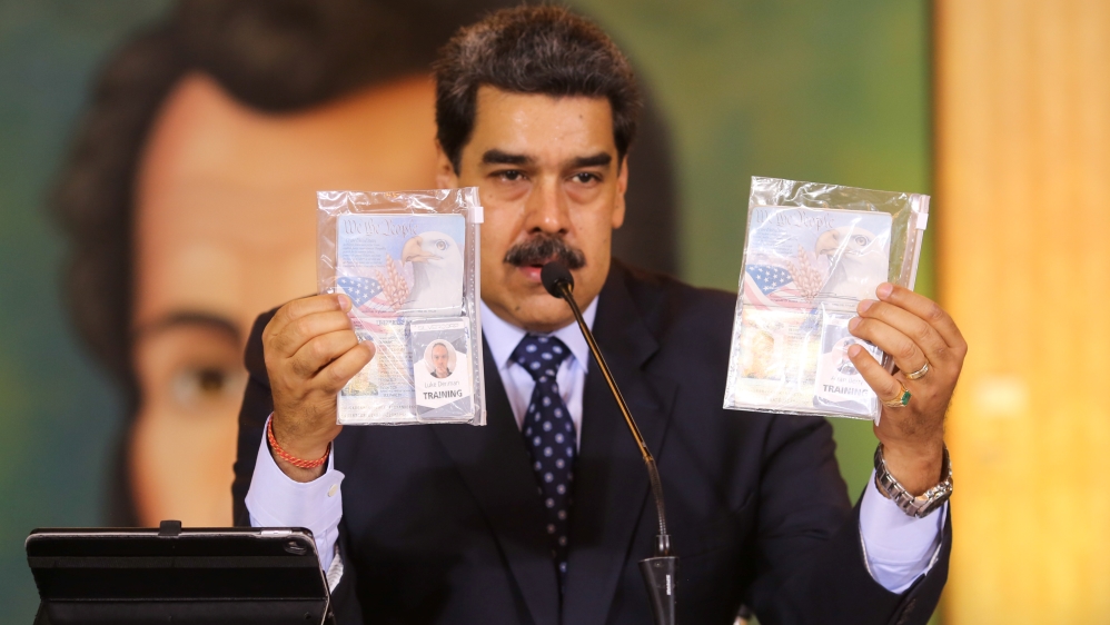 Personal documents are shown by Venezuela''s President Nicolas Maduro during a virtual news conference in Caracas
