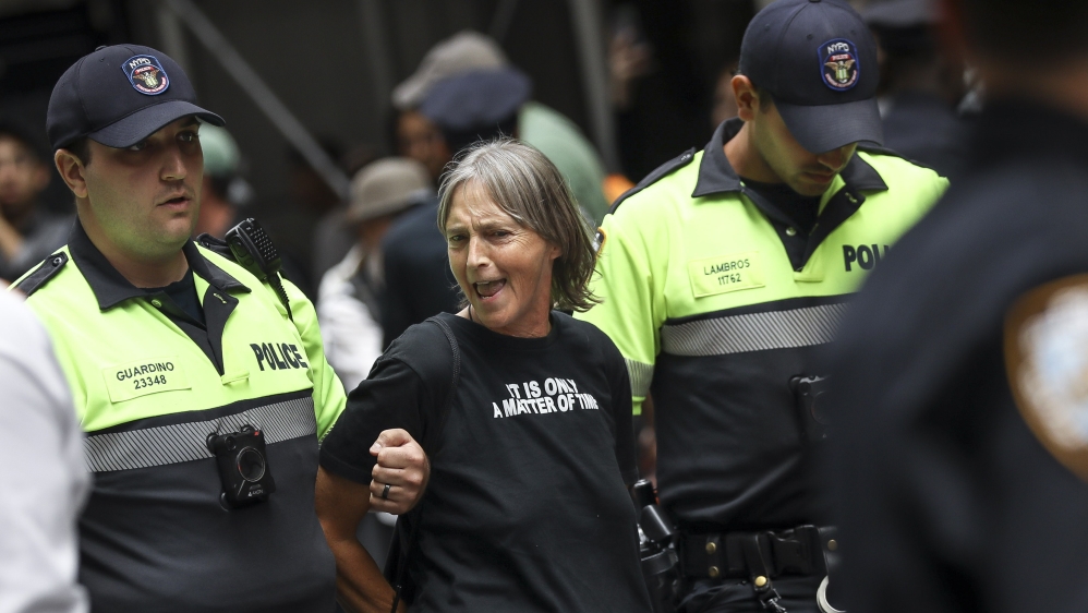Environmental Activists Hold Mock Funeral Procession To Financial District Calling For Action On Climate Issues