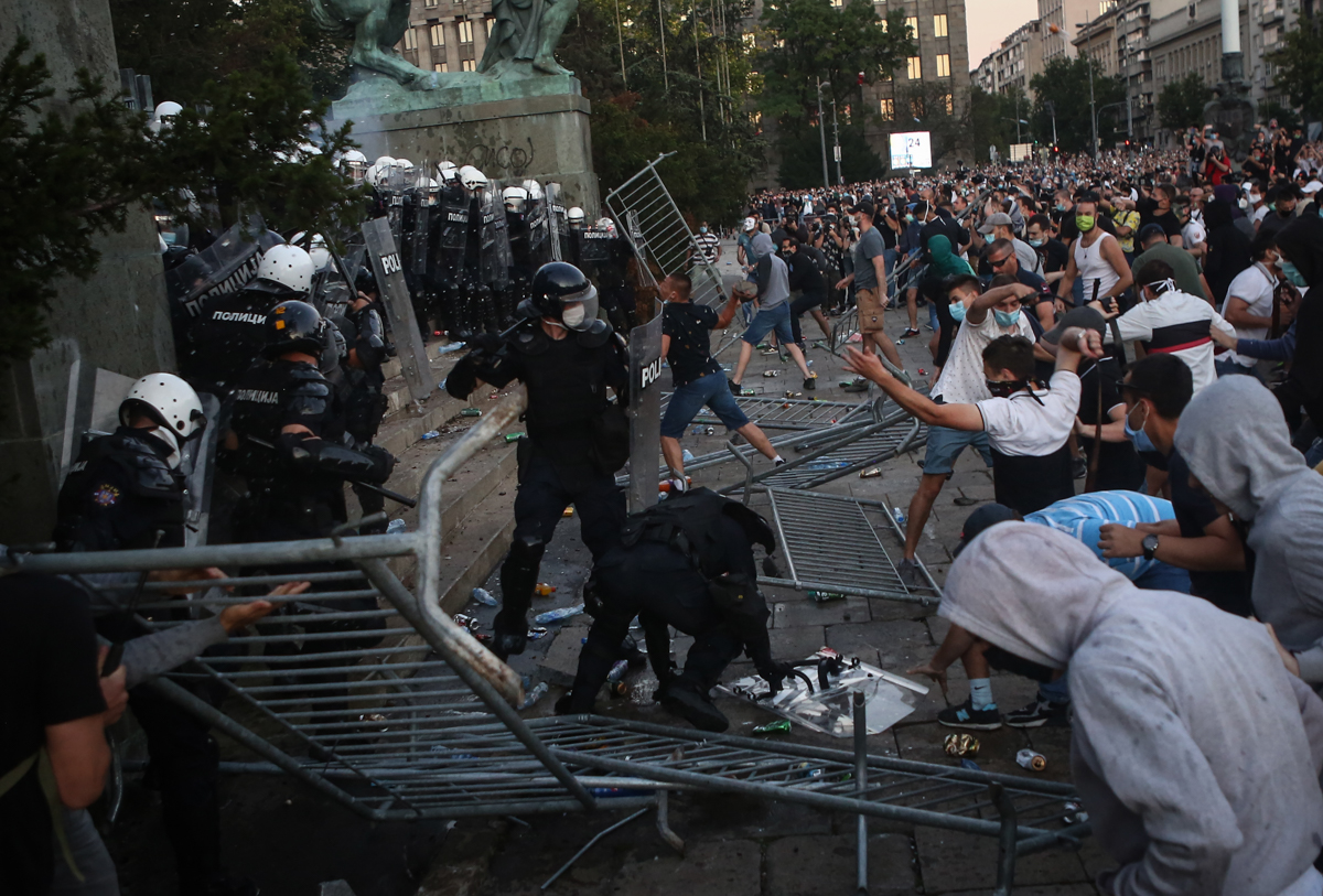 Protestors clash with police in Belgrade on July 8, 2020 as violence erupts against a weekend curfew announced to combat a resurgence of COVID-19 infections despite Serbia''s President Aleksandar Vucic