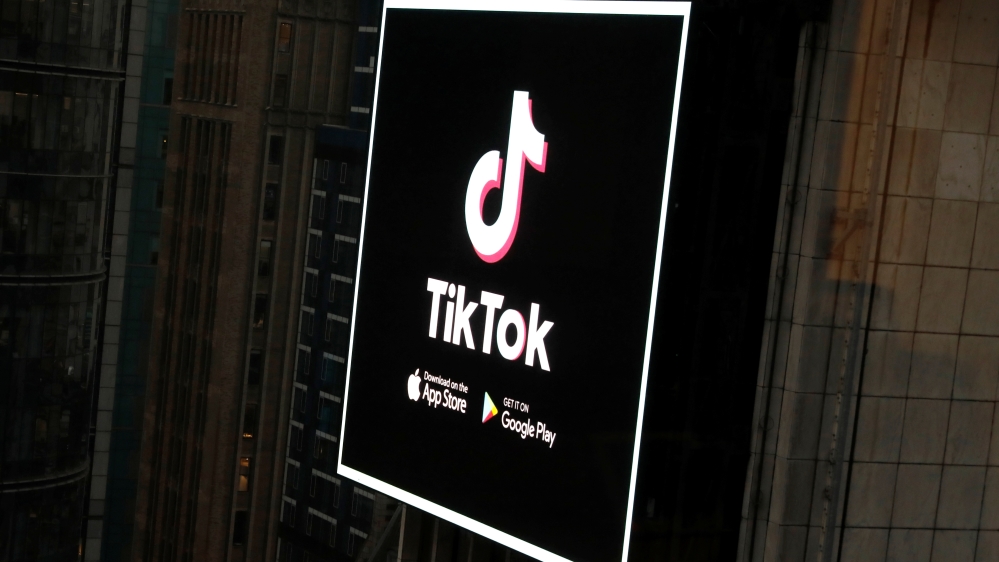 The TikTok logo is seen on a screen over Times Square in New York City