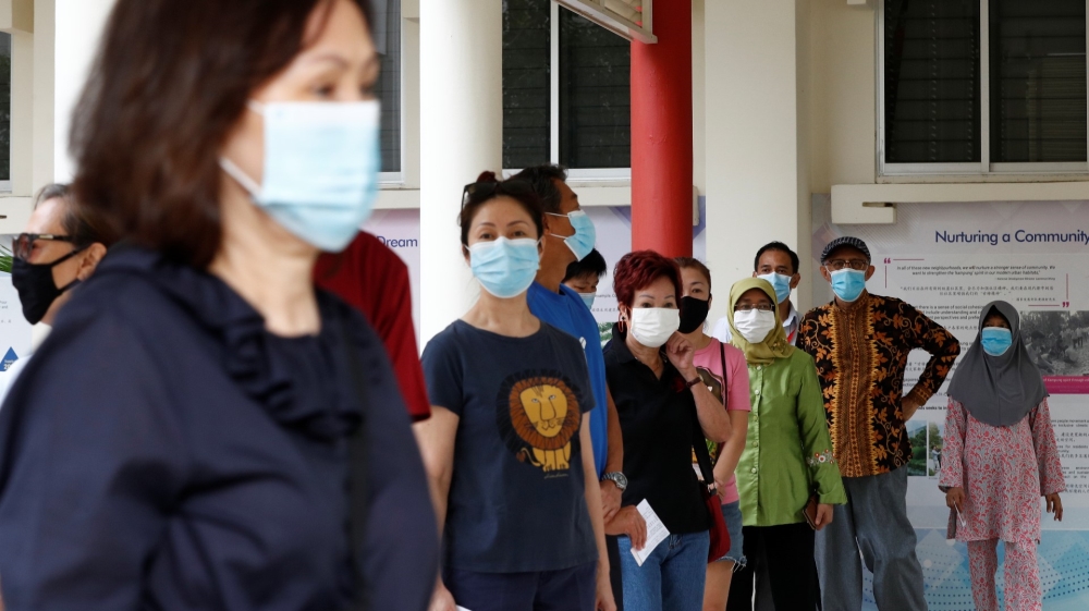People vote in Singapore's general election amid Covid-19