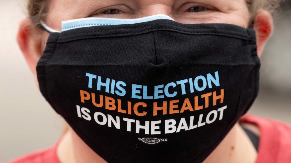 A teacher wearing a face mask during a protest in Westminster, California, US