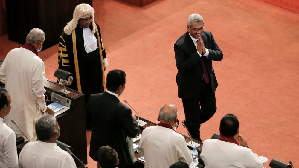 Gotabaya Rajapaksa and speaker Mahinda Yapa Abeywardena leave after the presentation of the new government’s policy statement during the inaugural session of the new parliament