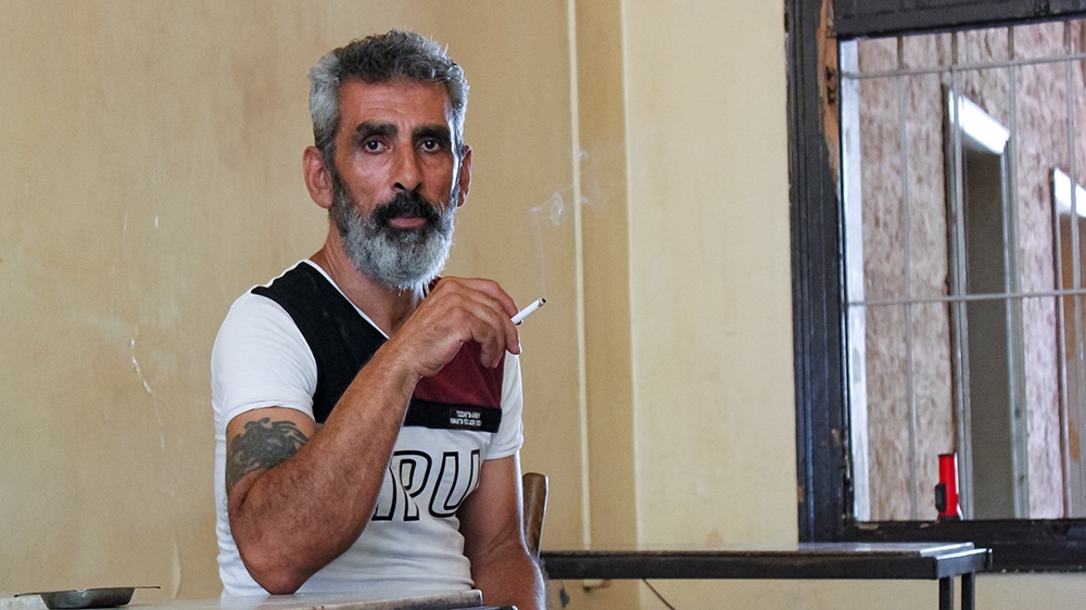Beirut homeless - Mahmoud Abbas, a 60-year-old hostel resident says he has nowhere to go if the authorities deem the building unsafe to live in and ask him to leave. [Arwa Ibrahim/Al Jazeera]
