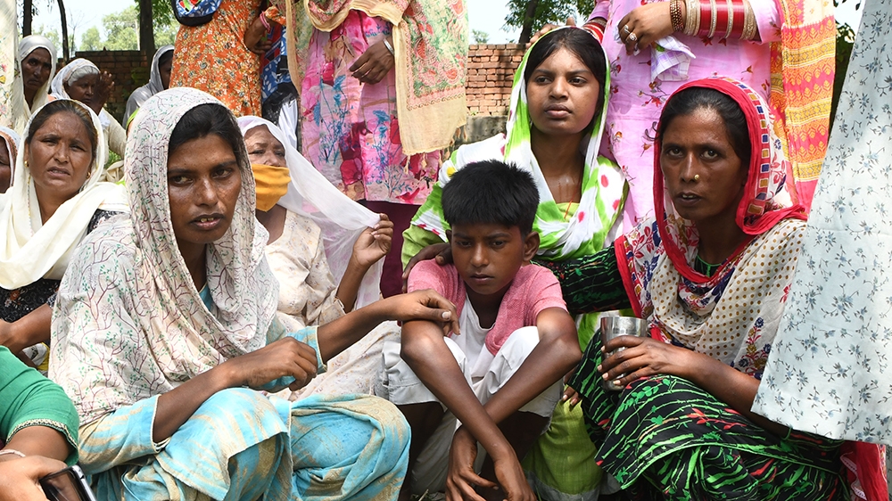 Relatives react during the cremation of Kirpal Singh, who died after allegedly drinking spurious alcohol in Muchhal village, about half an hour’s drive from Amritsar