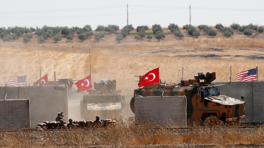 Turkish troops return after a joint U.S.-Turkey patrol