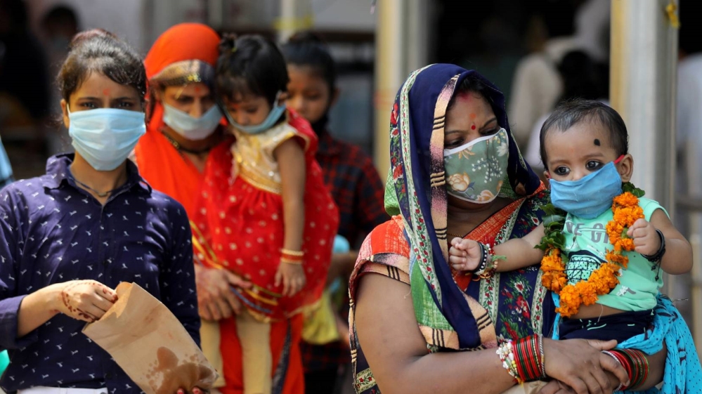 Infections in India grew by 66,999 on Thursday from a day earlier [EPA]