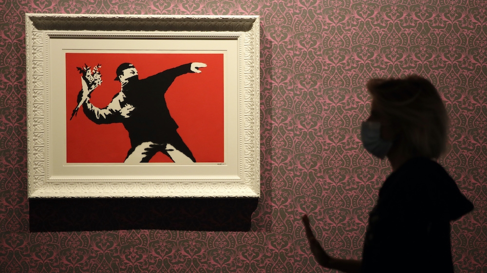 Banksy flower thrower