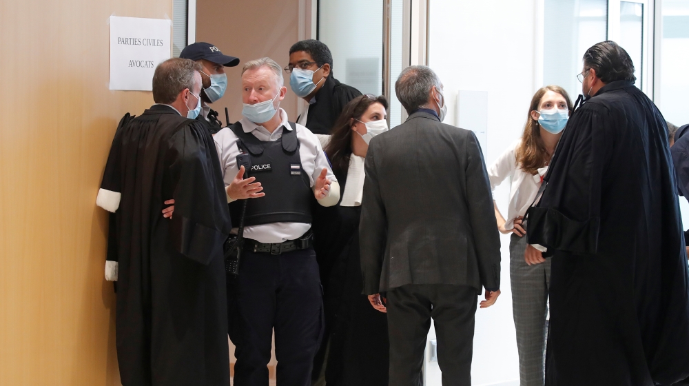 Lawyers for the victims enters the courtroom for the opening of the trial of the January 2015 Paris attacks against Charlie Hebdo satirical weekly, a policewoman in Montrouge and the Hyper Cacher kosh