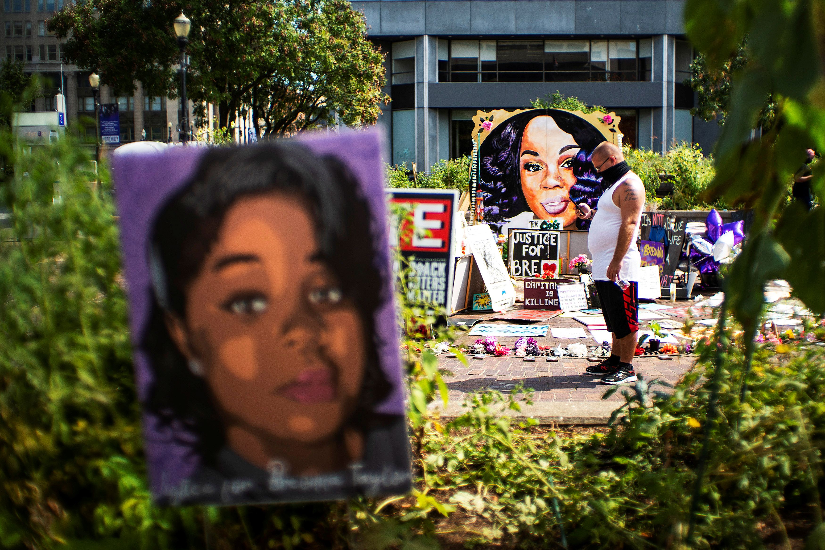 Breonna Taylor's killing has fueled mass protests across the United States and calls for an end to police violence and anti-Black racism [Eduardo Munoz/Reuters]