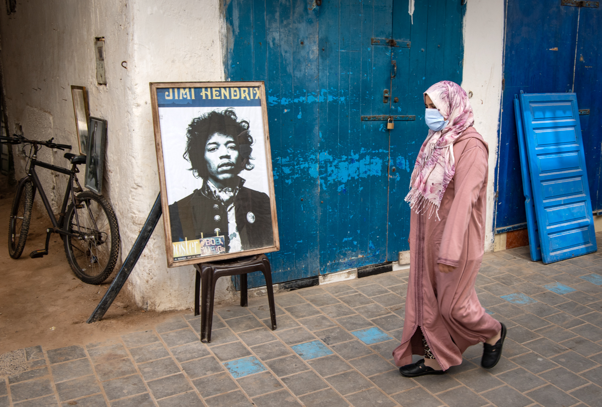 A picture taken in the Moroccan coastal city of Essaouira shows portraits of late US guitarist Jimi Hendrix on September 10, 2020. - Some claim to have seen him, others to have spoken with him -- 50 y