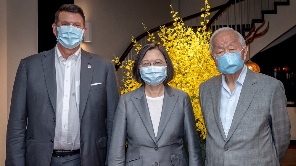 Taiwan’s President Tsai Ing-wen (C) poses for photographs with US Under Secretary of State for Economic Growth, Energy and the Environment Keith Krach (L), and Morris Chang, founder of Taiwan Semiconductor Manufacturing Company (TSMC), at the president’s home in Taipei