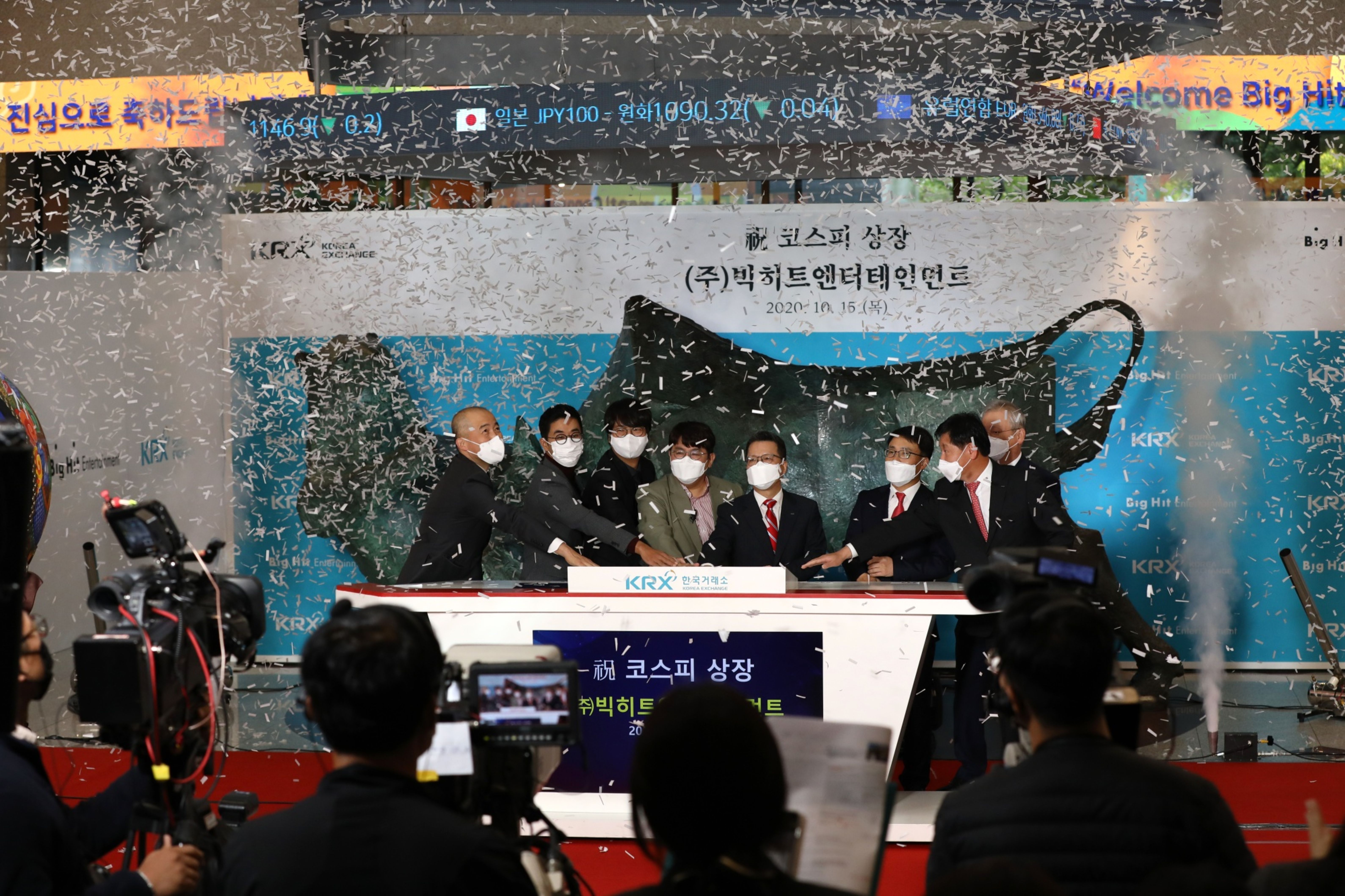 Big Hit Entertainment’s co-CEO Bang Si-hyuk, middle, had pledged in 2017 to double the company’s revenue every year, a promise he has kept [Bloomberg]