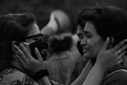 Bangladeshi women are overwhelmed with emotion during protests against rape and misogyny [Photo courtesy of Anirban Kaiser]