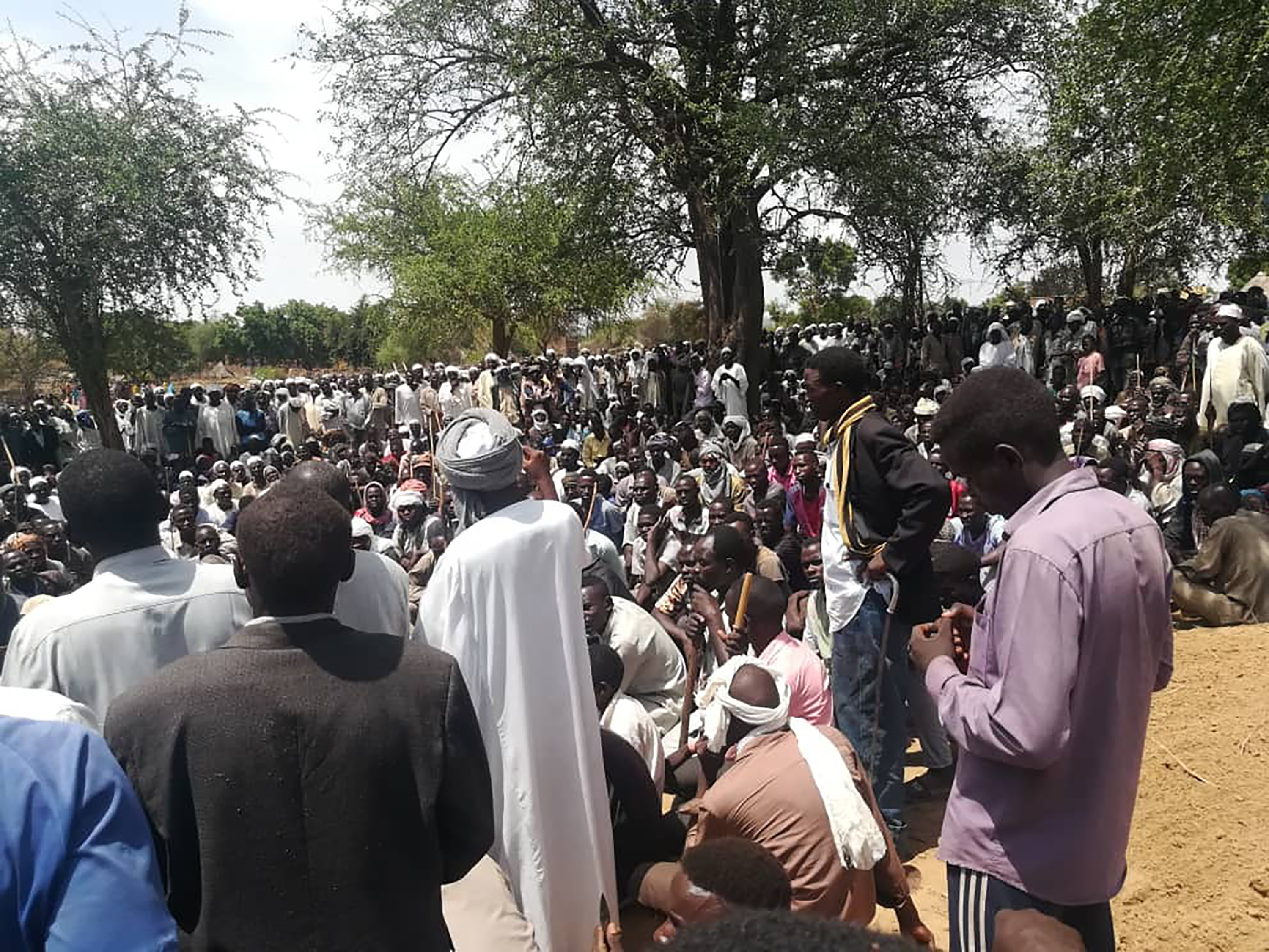 Residents gather for a mass funeral after an attack in the village of Masteri in west Darfur, Sudan on July 27, 2020 [File: Mustafa Younes/AP]