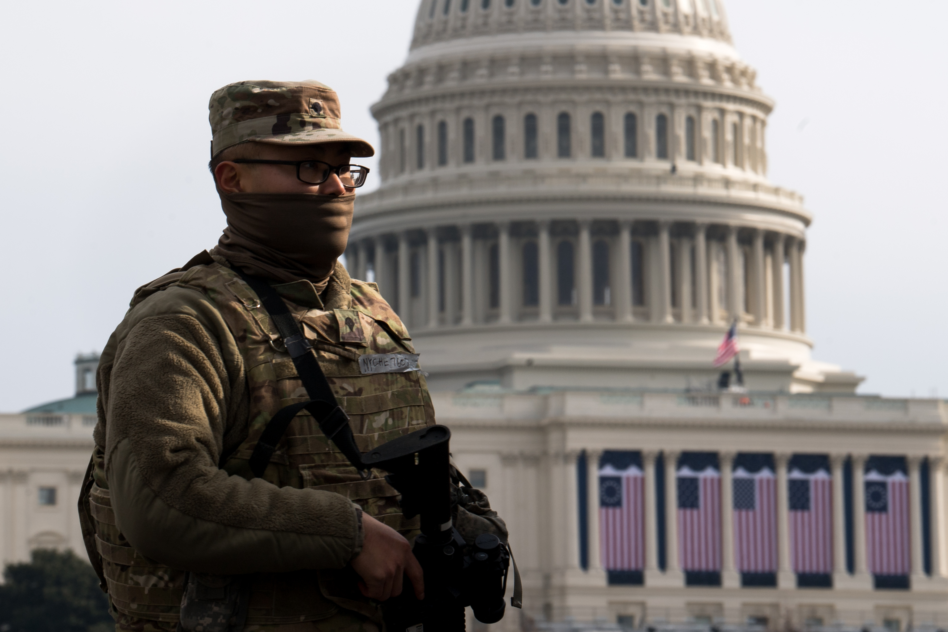 A National Guard stands at the US Capitol before the inauguration in Washington, DC [Liz Lynch/Getty Images/AFP]