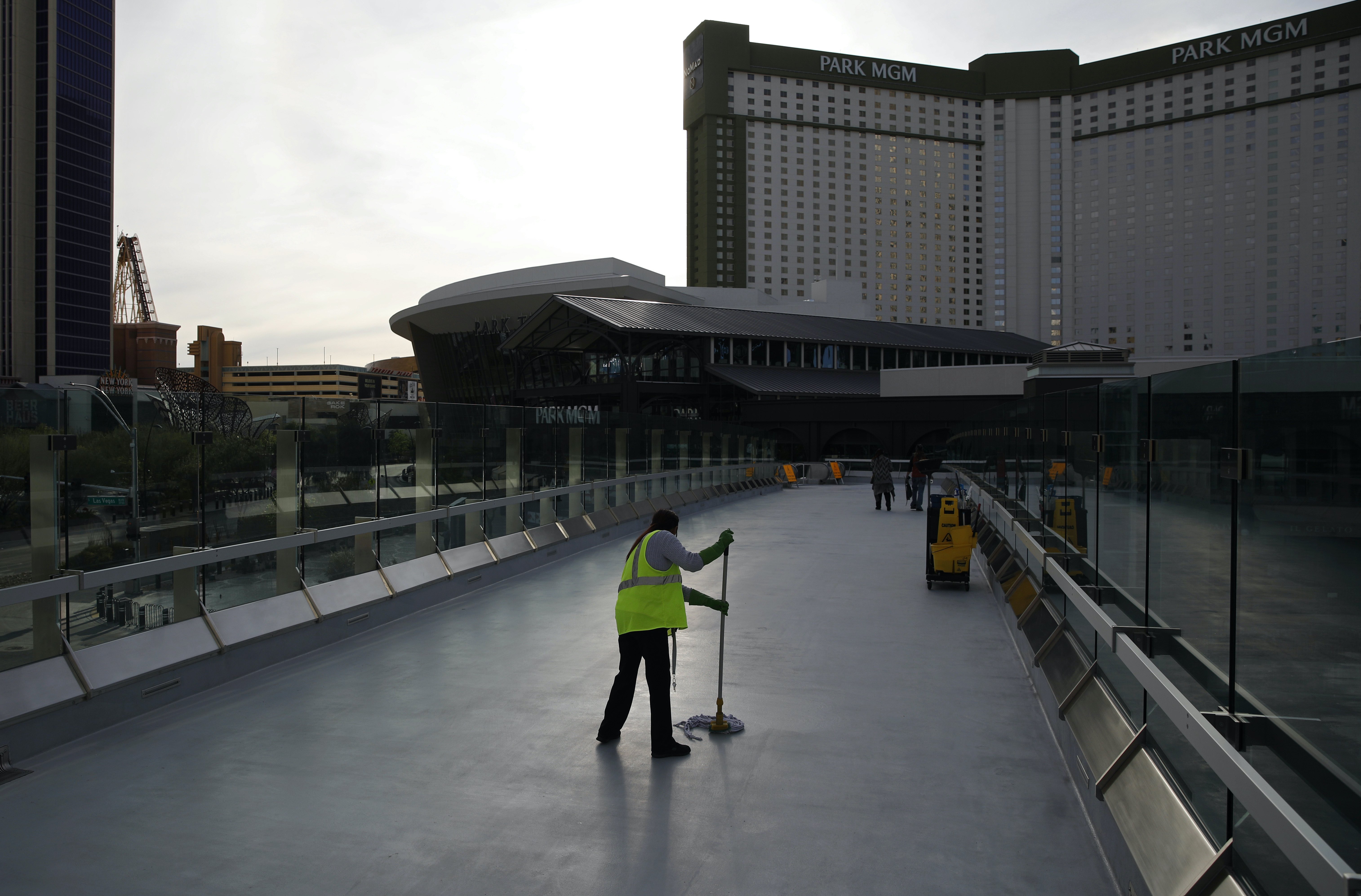 A worker cleans along the Las Vegas Strip, devoid of the usual crowds as casinos and other businesses are shuttered due to the coronavirus outbreak in Las Vegas, Nevada, the US