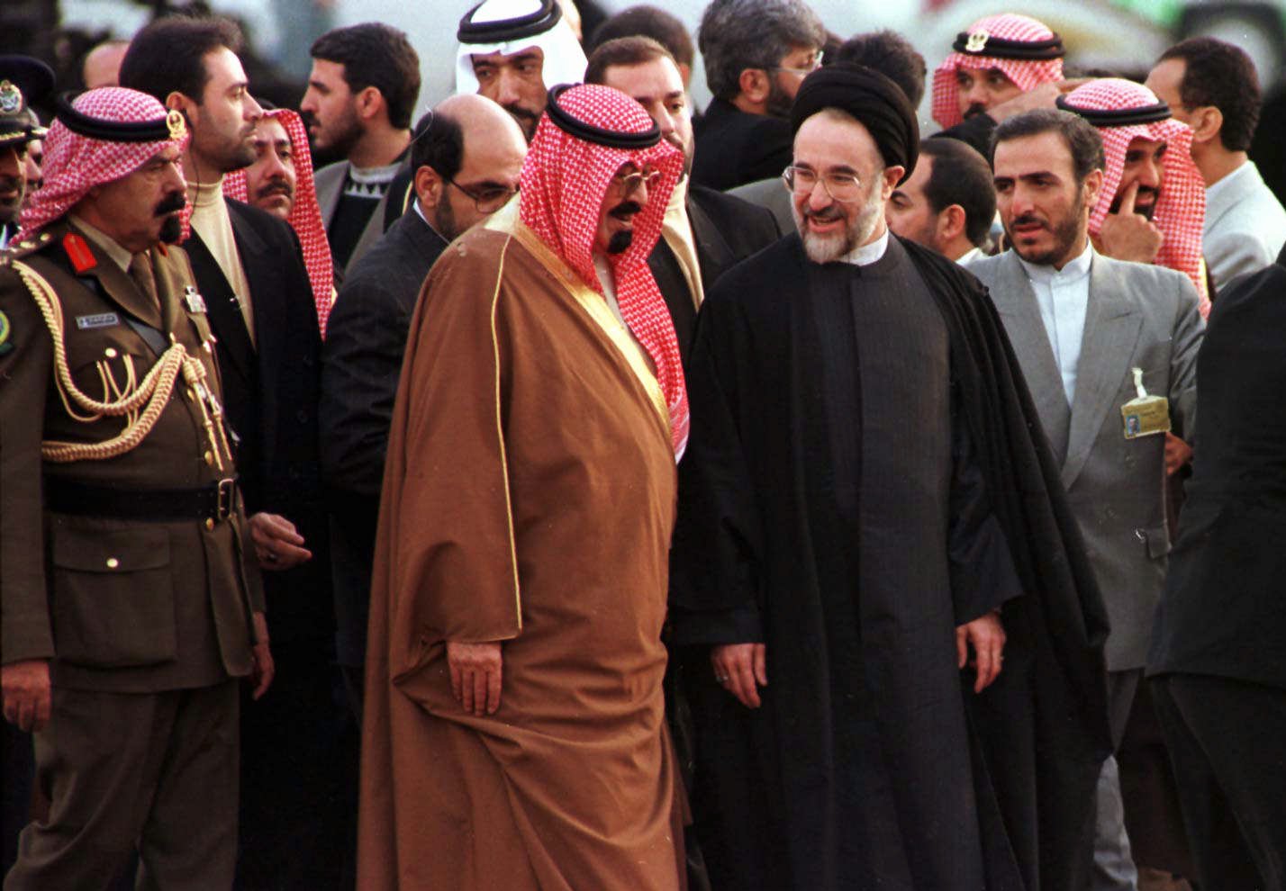 Saudi Arabia Crown Prince Abdullah Bin Abdul Aziz Al-Saud is greeted at Mehrabad Airport in Tehran by Iranian President Mohammad Khatami on December 8, 1997 [AP/Enric Marti]