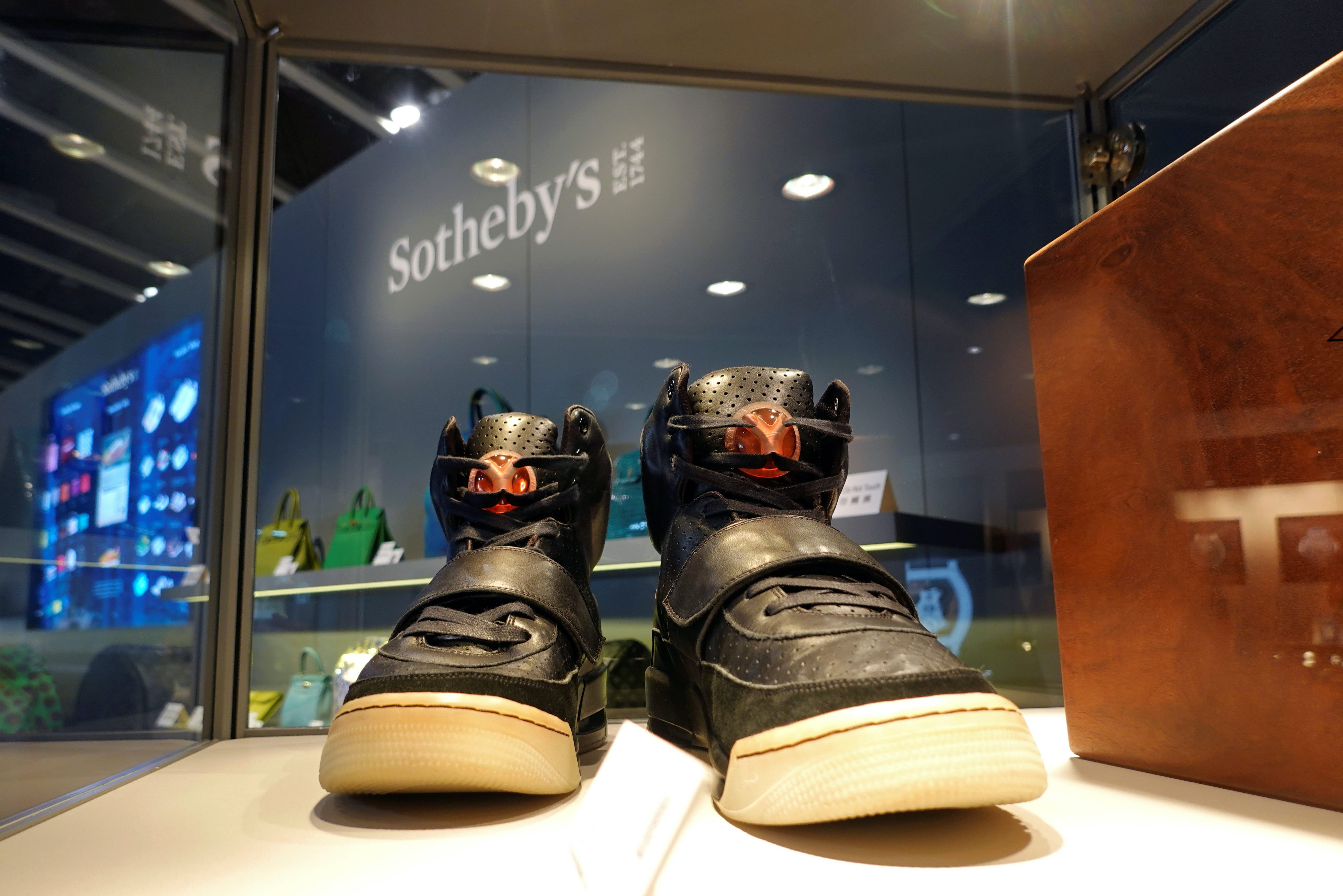 A pair of ‘Nike Air Yeezy 1’ prototype sneakers designed by Kanye West are displayed at the Hong Kong Convention and Exhibition Centre before going up for private sale at Sotheby’s, in Hong Kong, China