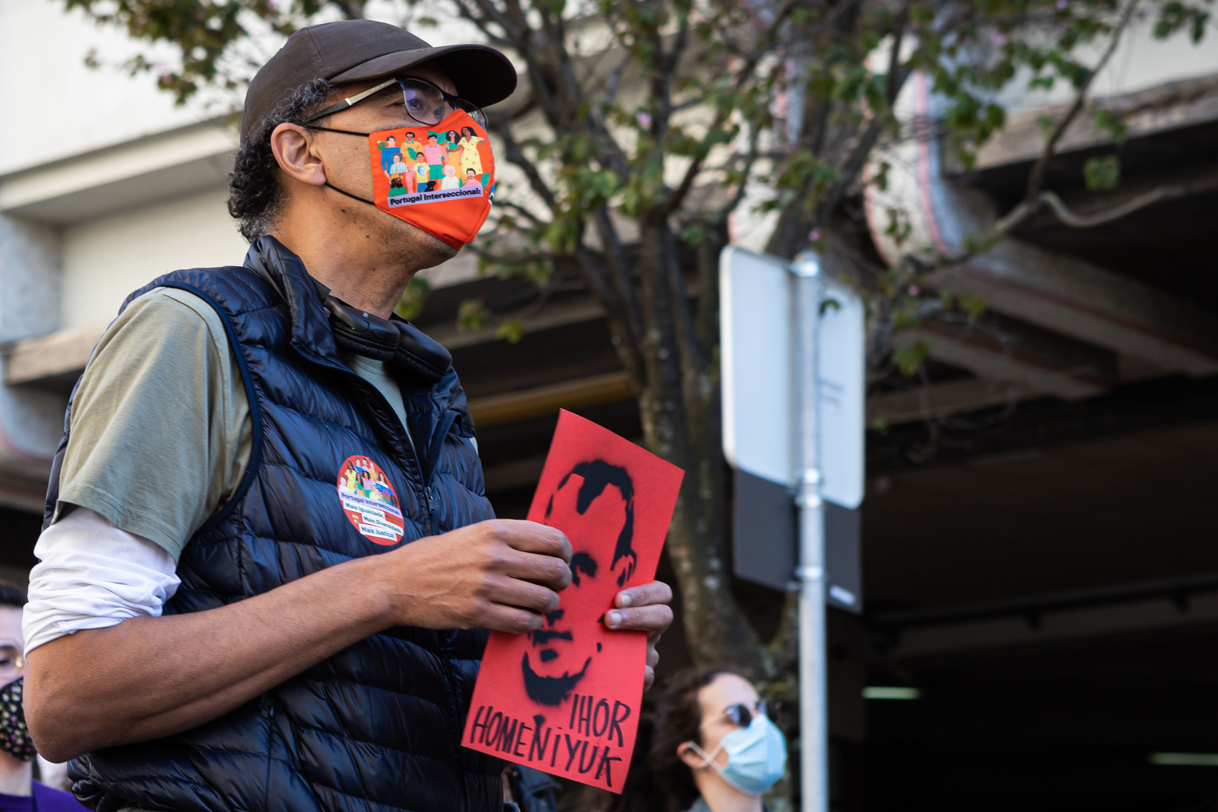 A protester pays tribute to Ihor Homenyuk during a World Against Racism demonstration organised by Núcleo Antifascista do Porto (Antifascist Porto) [File: Teresa Nunes/SOPA Images/LightRocket via Getty Images]