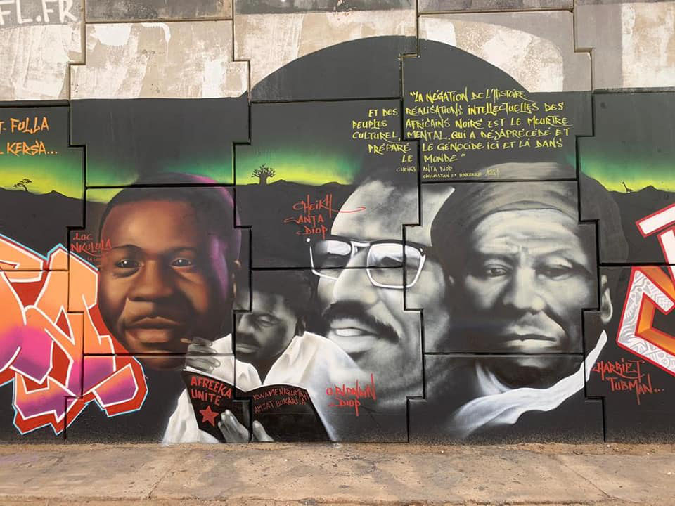 Omar Blondin Diop depicted among other African and African American activists in a mural painted on June 15, 2020 by the Senegalese graffiti collective Radikal Bomb Shot in Dakar [Courtesy of RBS]