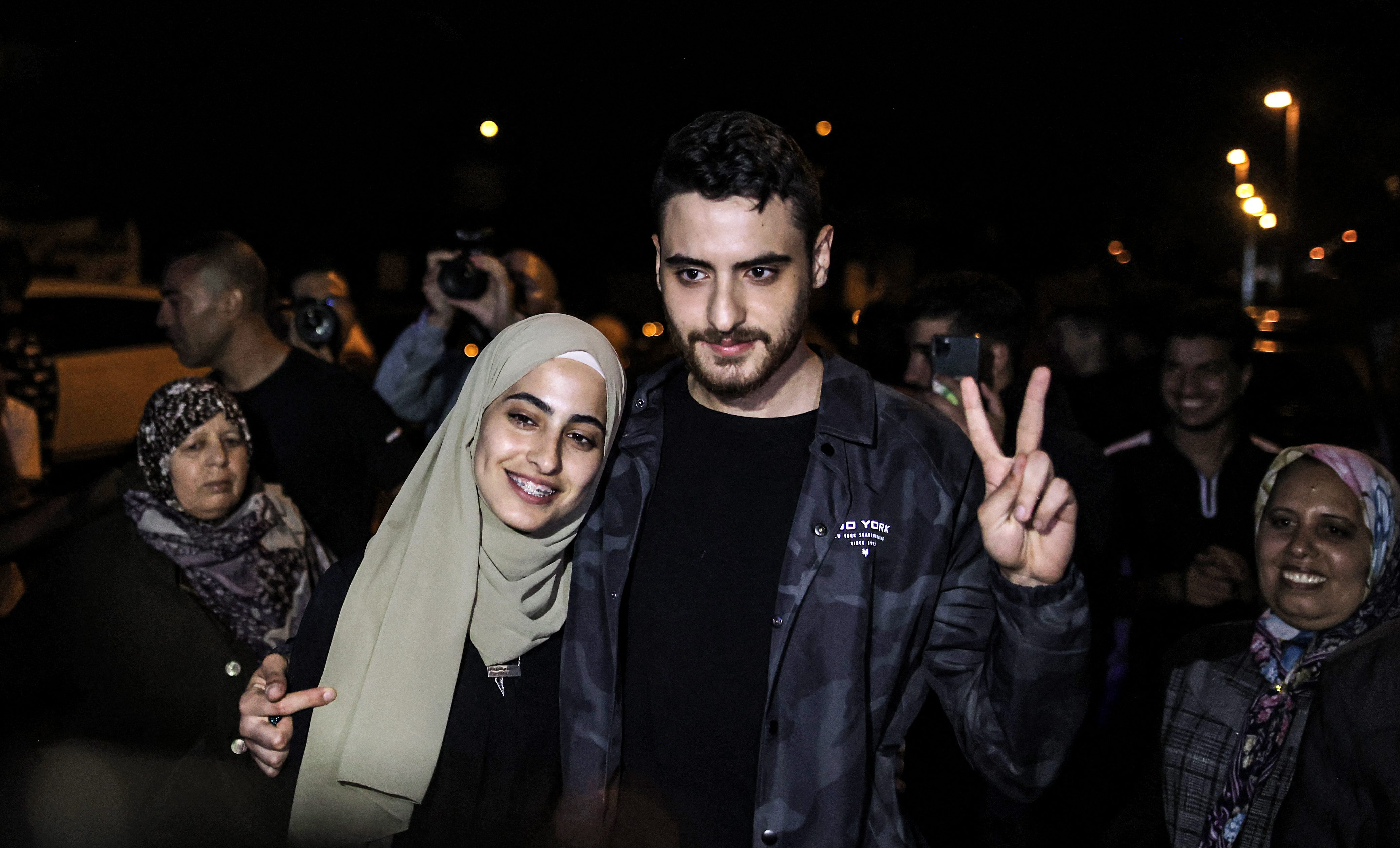 Palestinian activists Muna and Mohammed al-Kurd were arrested and later released by Israeli authorities in the Sheikh Jarrah neighbourhood [File: Ahmad Gharabli/AFP]