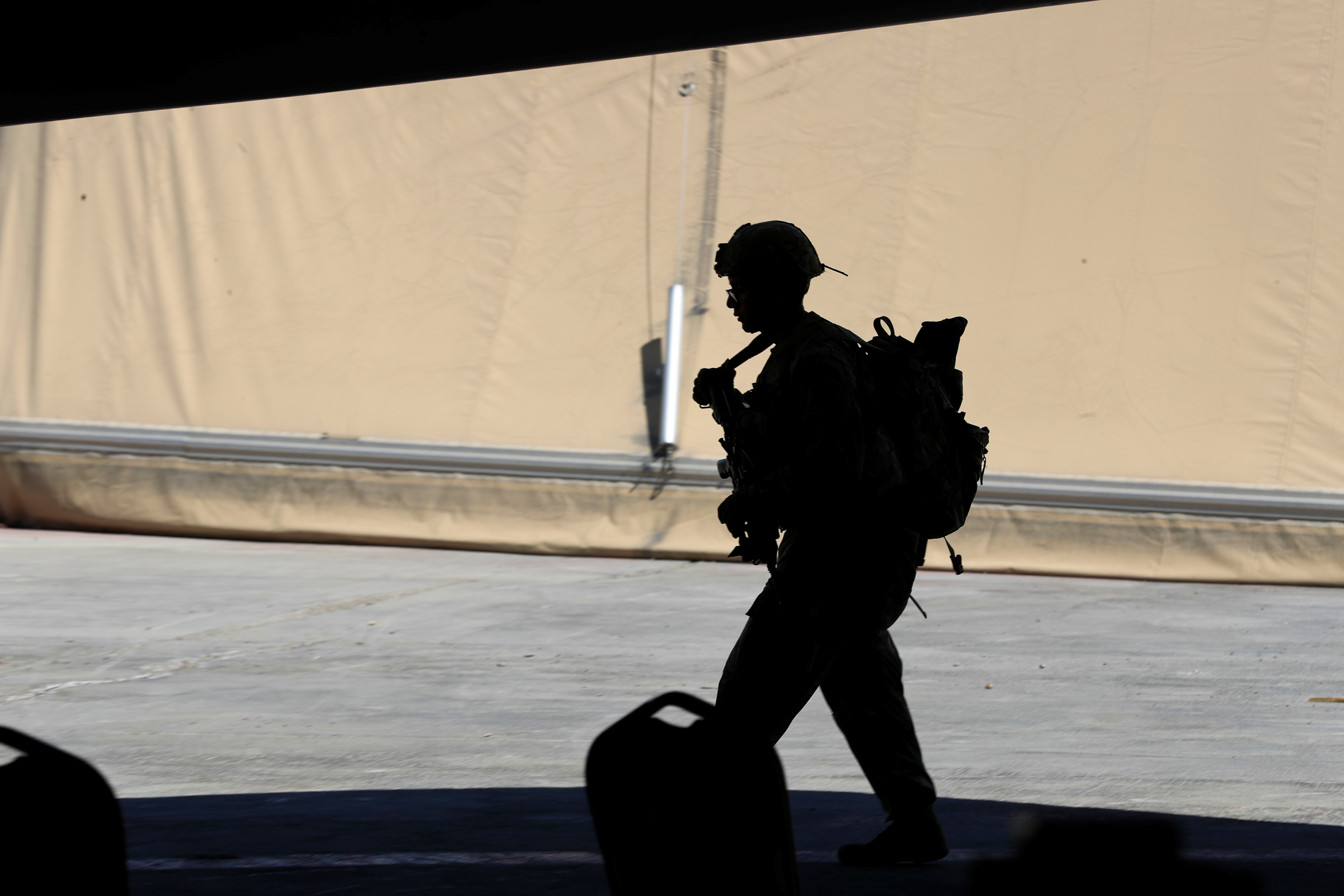 A U.S. soldier is seen during a handover ceremony of Taji military base from US-led coalition troops to Iraqi security forces, in the base north of Baghdad, Iraq August 23, 2020. REUTERS/Thaier Al-Sudani